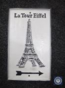 A cast metal plaque - The Eiffel Tower