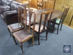 A mahogany gate leg table and six mahogany chairs
