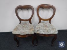 A pair of Victorian mahogany dining chairs