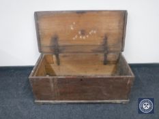 An antique pine blanket box