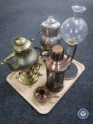 A tray containing copper lantern, brass spirit kettle on stand, plated samovar,