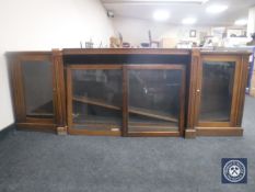 A Victorian mahogany door break front bookcase base