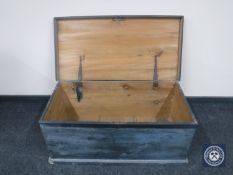 An antique pine blanket box