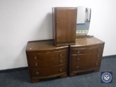 A mid 20th century oak three-drawer dressing chest with matching three-drawer chest and an oak pot