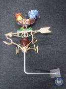 A cast metal cockerel weather vane