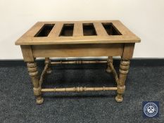 An Edwardian luggage stand