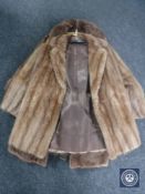 Two mink fur coats