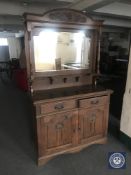 A late Victorian oak mirror backed sideboard,