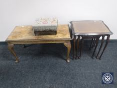 A nest of three mahogany glass and leather top tables together with an antique tapestry upholstered