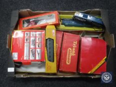 A box of Hornby and Lilliput boxed rolling stock and train accessories