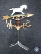 A cast metal horse weather vane