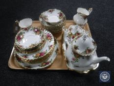 A tray of twenty-nine pieces of Royal Albert Old Country Roses china