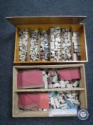 Two mid 20th century wooden boxes containing Lotts building bricks