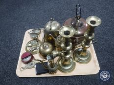 A tray of antique copper and brass kettle together with assorted brass ware including candlesticks,