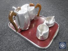 A four-piece Picquot ware tea service on tray