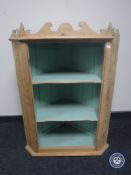 A set of antique pine corner shelves