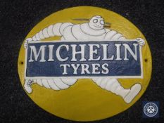 A cast metal plaque - Michelin Tyres