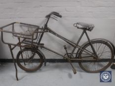 A mid 20th century Gundle shop delivery bike,