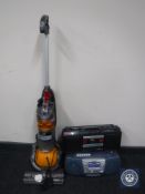 A Dyson DC 24 ball vacuum cleaner and two stereo CD cassette players