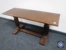 An oak refectory coffee table