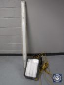 Two 110 volt site lights together with an extension lead