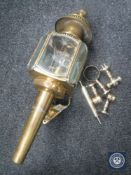 A Limehouse Lamp Company brass carriage lamp (converted) and a box of metal fittings