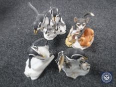 Four Franklin Mint figures of penguins and cats