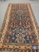An antique Caucasian rug,
