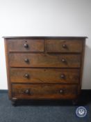 A Victorian mahogany five drawer chest