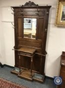 An early 20th century French walnut mirrored hall stand,
