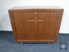 A 20th century teak church cabinet