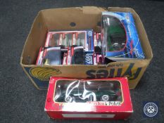 A box of boxed Corgi Collection James Bond vehicles and a Tonka Jaguar Mark II