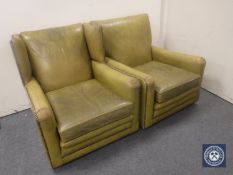 An early 20th century olive-leather upholstered wingback armchair and similar club armchair