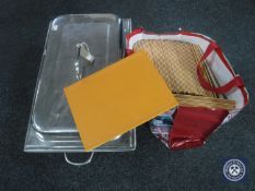 A stainless steel chafing dish,