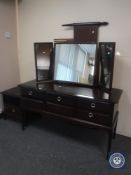 A Stag Minstrel dressing chest with mirror (handle missing),