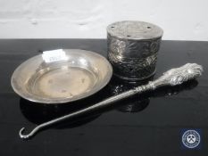 A silver shallow dish,