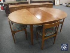 A six-piece mid 20th century teak dining room suite