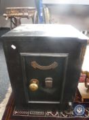 A fire resistant safe with key CONDITION REPORT: 61cm high by 45cm wide by 48cm deep.