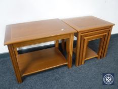 A nest of three inlaid tables and a matching coffee table