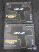 Two boxed Regimental Police mini uzi electric guns