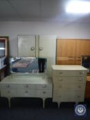 A three-piece limed oak bedroom suite and set of 4' bed ends