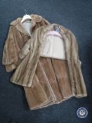 A fur wrap and a simulated fur coat