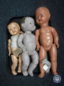 A tray of three vintage dolls including a British Made Rosebud