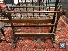 A Victorian carved mahogany towel rail,