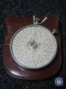 A Fowler's Long scale calculator in original brown leather wallet.