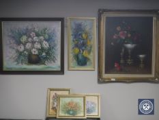 A gilt framed oil on canvas of flowers in a vase by R.