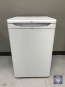 An Indesit under bench fridge