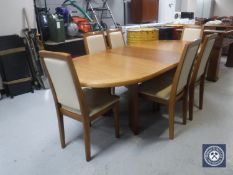 A Skovby contemporary extending dining table (total length 225cm) and six chairs