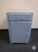 A mid 20th century painted metal kitchen cupboard fitted a drawer