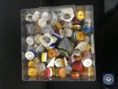 A collection of several hundred watch movement balances,